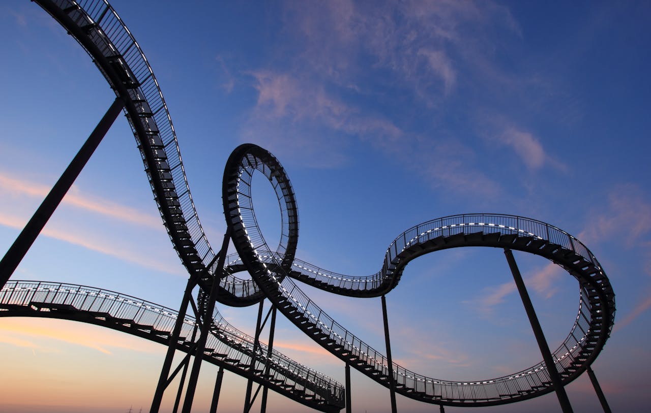 Rollercoaster loops as a reference to loops in programming and coding.